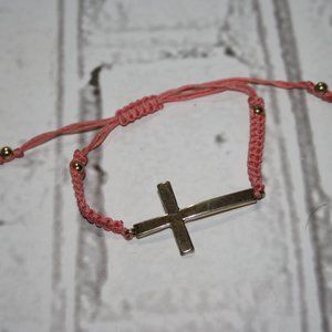 Beautiful gold cross and coral cord adjustable bracelet